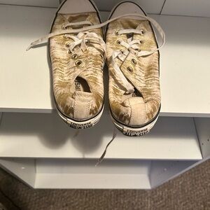 Gold and white womens converse shoe